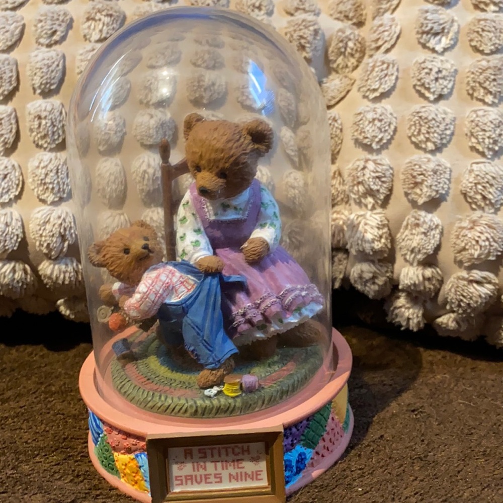 Bear figurine.  A stitch in time saves nine.